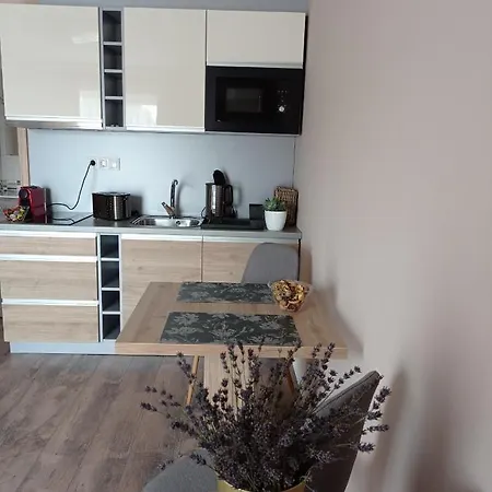 Апартаменты Karos Bianco Apartmanhaz