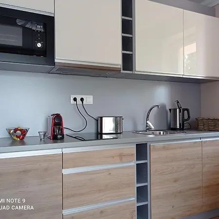 Апартаменты Karos Bianco Apartmanhaz